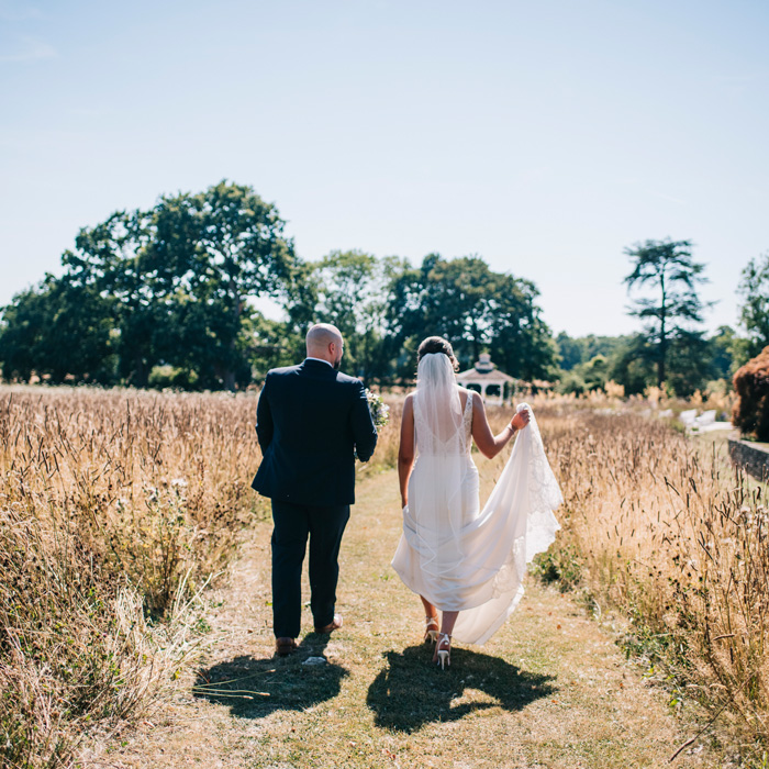 A couple walking in the grounds