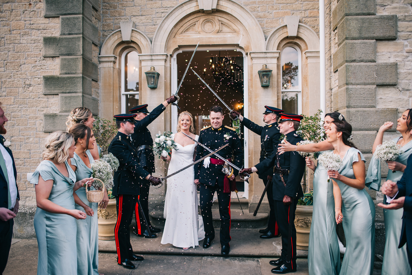 A bride and groom in uniform