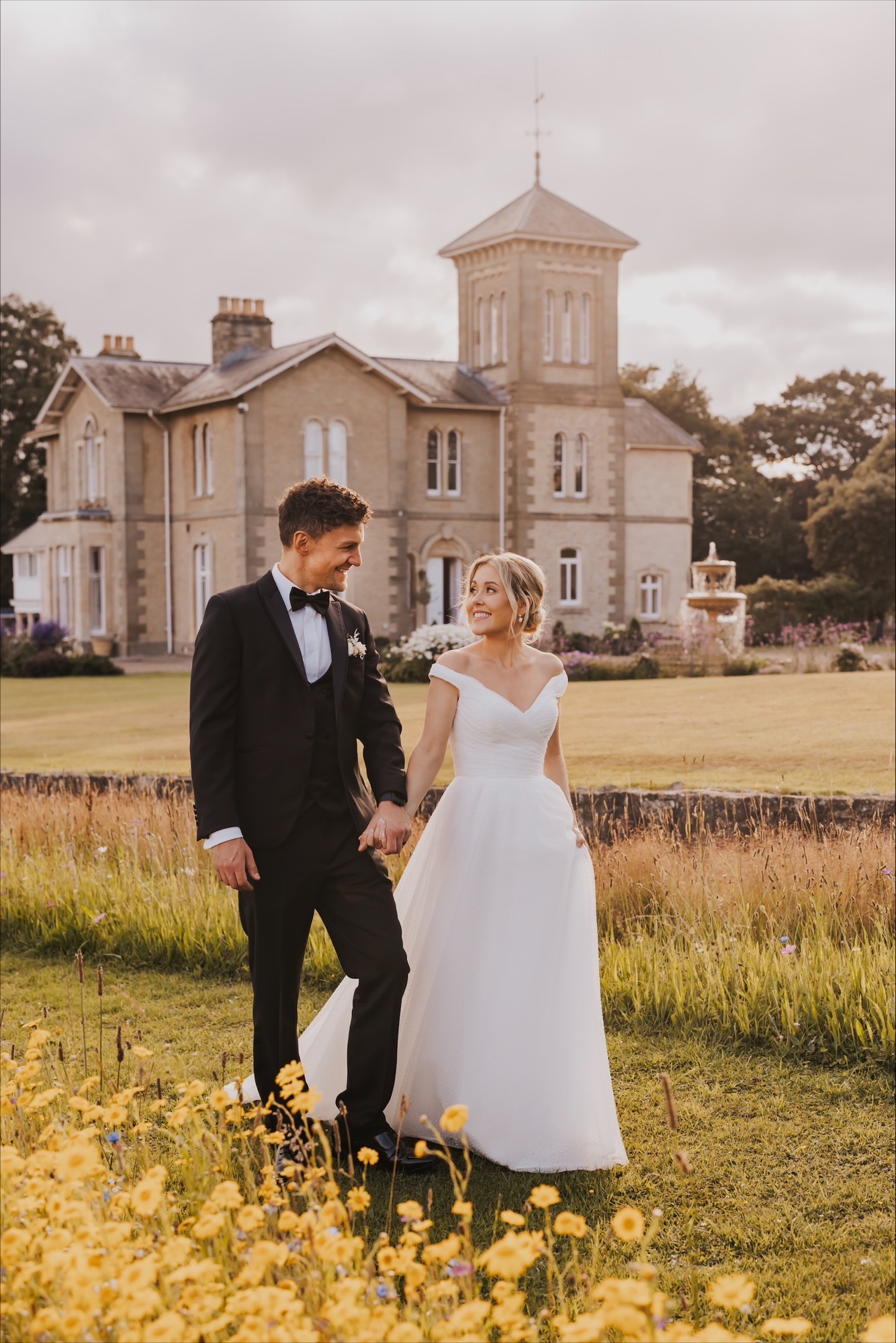 A couple walking in the grounds